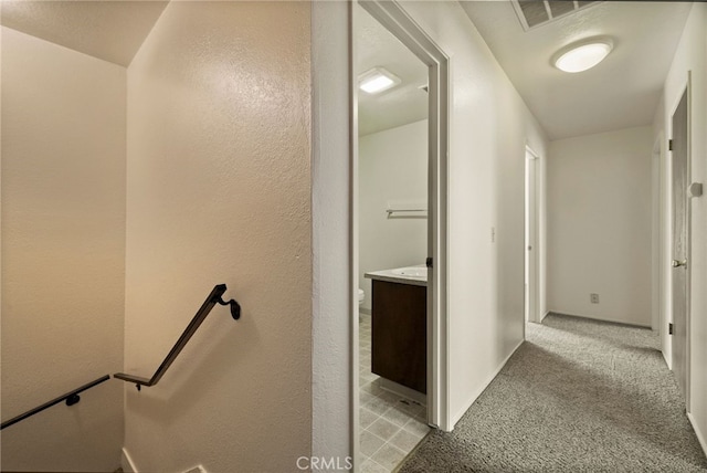 642 W 1st Ave, Chico, CA 95926 - staircase featuring carpet flooring and a textured wall