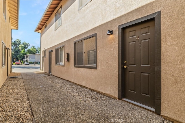 642 W 1st Ave, Chico, CA 95926 - entrance to property featuring stucco siding