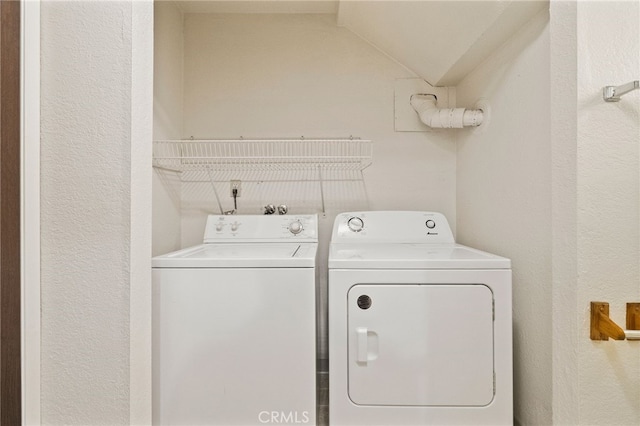 642 W 1st Ave, Chico, CA 95926 - laundry area featuring separate washer and dryer and a textured wall