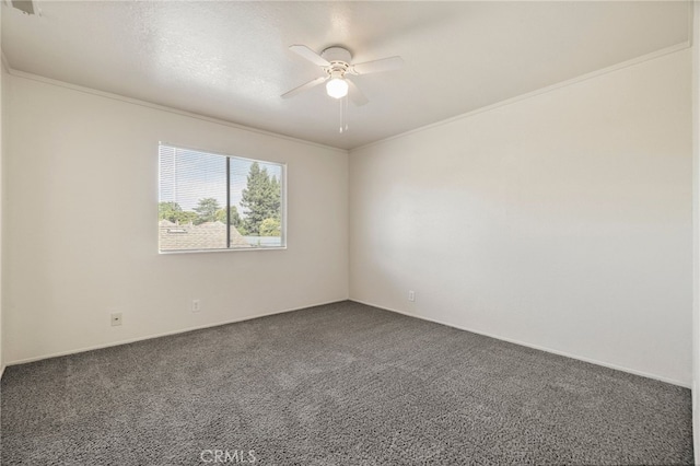 642 W 1st Ave, Chico, CA 95926 - spare room featuring a ceiling fan, dark colored carpet, and ornamental molding