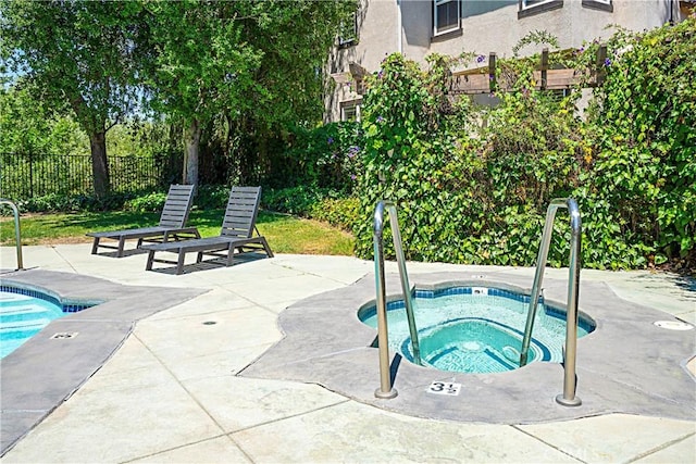 26675 Country Creek Ln, Calabasas, CA 91302 - view of swimming pool featuring a hot tub, a pool, and a patio area
