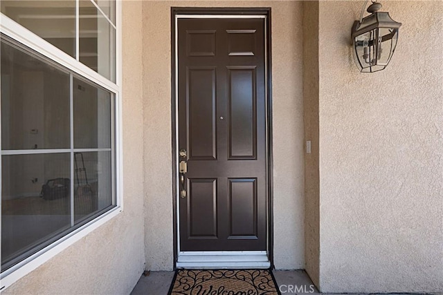 26675 Country Creek Ln, Calabasas, CA 91302 - view of exterior entry with stucco siding