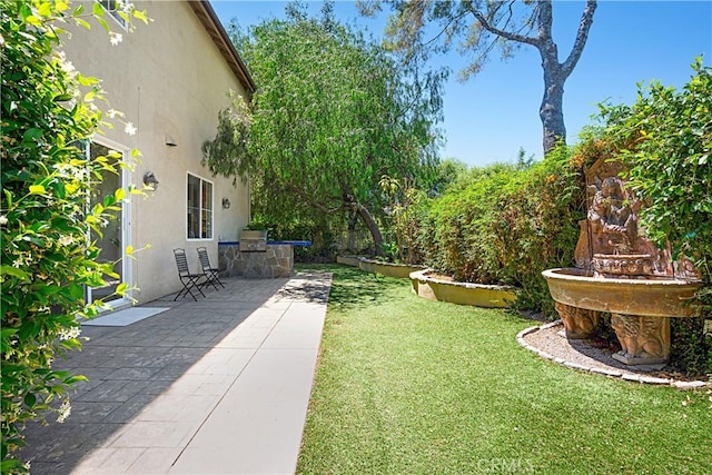 26675 Country Creek Ln, Calabasas, CA 91302 - view of grassy yard with a patio area