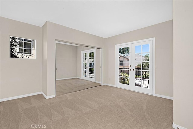 26675 Country Creek Ln, Calabasas, CA 91302 - unfurnished room featuring french doors, carpet floors, and plenty of natural light