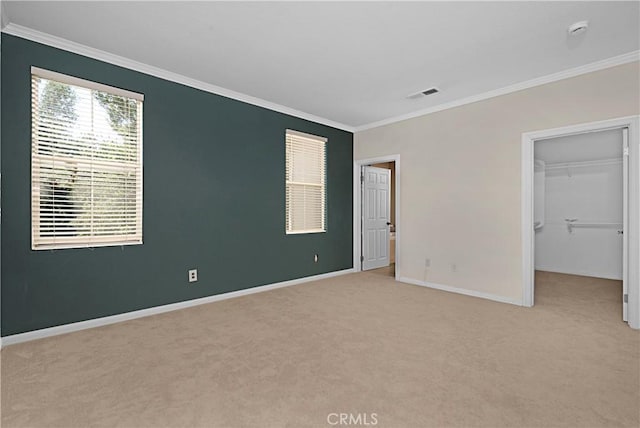 26675 Country Creek Ln, Calabasas, CA 91302 - unfurnished bedroom featuring carpet floors, crown molding, a spacious closet, and a closet