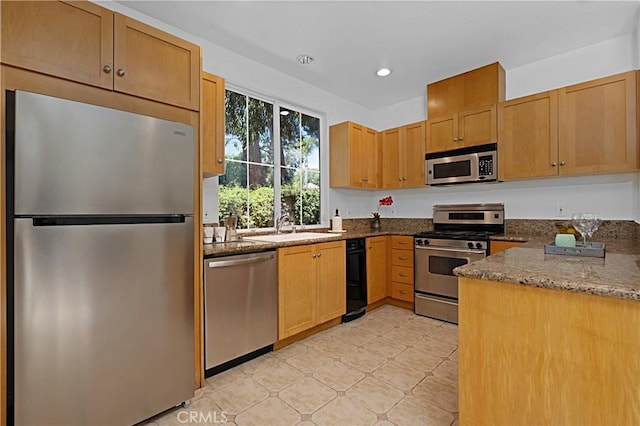 26675 Country Creek Ln, Calabasas, CA 91302 - kitchen featuring appliances with stainless steel finishes, recessed lighting, and dark stone countertops