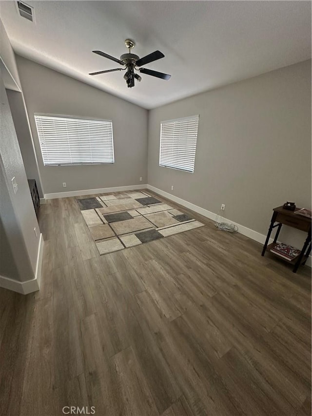 2775 Canyon View Cir, Corona, CA 92882 - unfurnished bedroom featuring dark wood finished floors and a ceiling fan