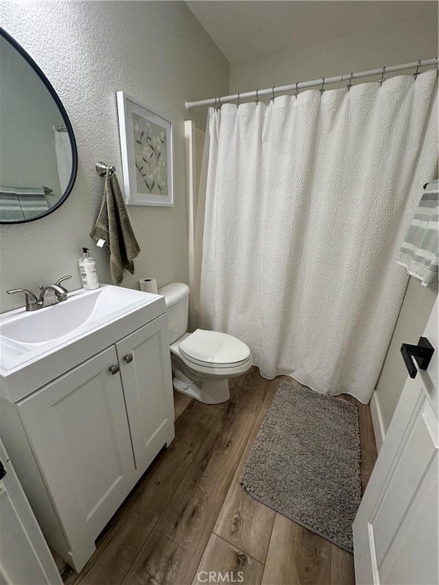 2775 Canyon View Cir, Corona, CA 92882 - full bathroom with wood finished floors, vanity, and curtained shower