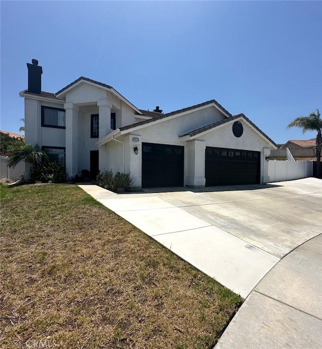 2775 Canyon View Cir, Corona, CA 92882 - view of front of house with an attached garage, a chimney, driveway, and stucco siding