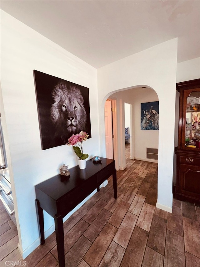 3620 Hoover St, Riverside, CA 92504 - corridor featuring arched walkways and wood finished floors