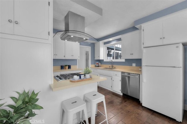 3144 W 154th Pl, Gardena, CA 90249 - kitchen featuring stainless steel appliances, island exhaust hood, white cabinetry, light countertops, and dark wood finished floors