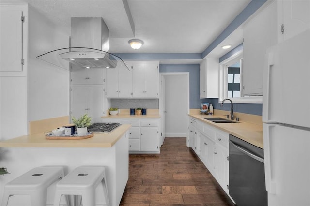 3144 W 154th Pl, Gardena, CA 90249 - kitchen with freestanding refrigerator, dishwasher, island exhaust hood, white cabinetry, and light countertops