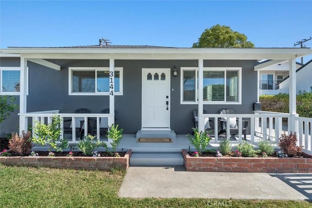 3144 W 154th Pl, Gardena, CA 90249 - view of front of house with a porch and stucco siding