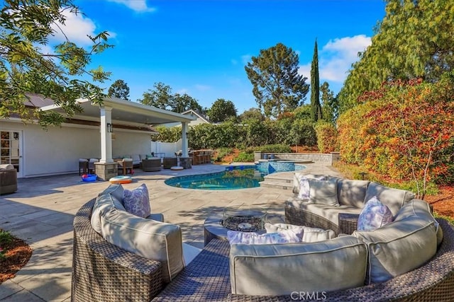 124 Marion Blvd, Fullerton, CA 92835 - view of swimming pool with an outdoor living space with a fire pit and a patio area