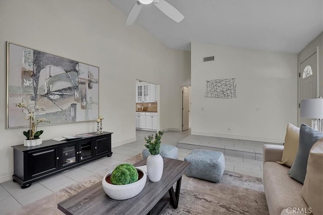 124 Marion Blvd, Fullerton, CA 92835 - living room featuring a ceiling fan, high vaulted ceiling, and tile patterned flooring