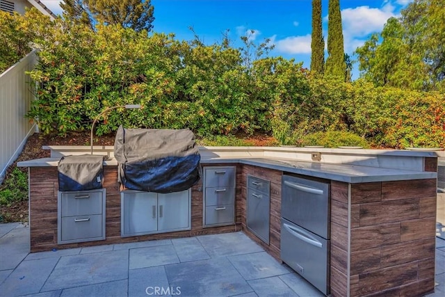 124 Marion Blvd, Fullerton, CA 92835 - view of patio / terrace featuring exterior kitchen