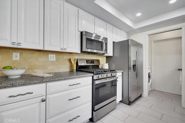 124 Marion Blvd, Fullerton, CA 92835 - kitchen with stainless steel appliances, white cabinetry, tasteful backsplash, and recessed lighting