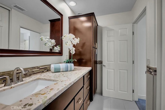 124 Marion Blvd, Fullerton, CA 92835 - bathroom with vanity, tile patterned flooring, decorative backsplash, and recessed lighting