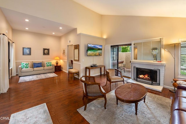 3762 Via Pacifica Walk, Oxnard, CA 93035 - living area featuring high vaulted ceiling, recessed lighting, wood finished floors, and a fireplace