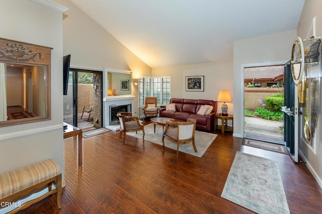 3762 Via Pacifica Walk, Oxnard, CA 93035 - living room featuring high vaulted ceiling, a fireplace, and wood finished floors