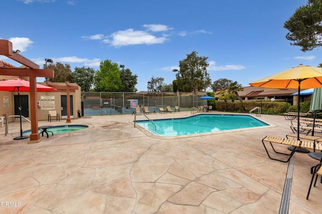 3762 Via Pacifica Walk, Oxnard, CA 93035 - community pool with a patio area and a hot tub