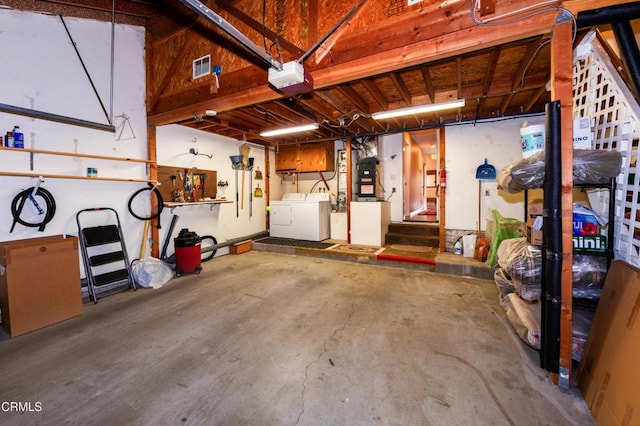 3762 Via Pacifica Walk, Oxnard, CA 93035 - garage featuring washer and clothes dryer and a garage door opener