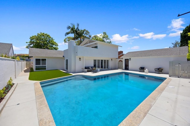 11741 Foster Rd, Los Alamitos, CA 90720 - view of pool with a fenced backyard and a patio area