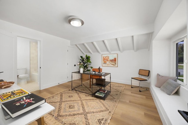 11741 Foster Rd, Los Alamitos, CA 90720 - home office with wood finished floors and baseboards