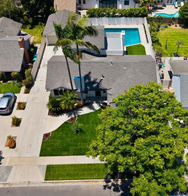 11741 Foster Rd, Los Alamitos, CA 90720 - view of subject property with a pool