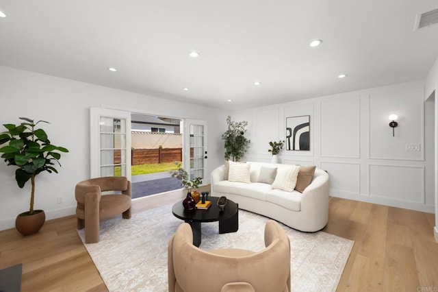 19222 S Grandee Ave, Carson, CA 90746 - living area with light wood-style flooring and recessed lighting