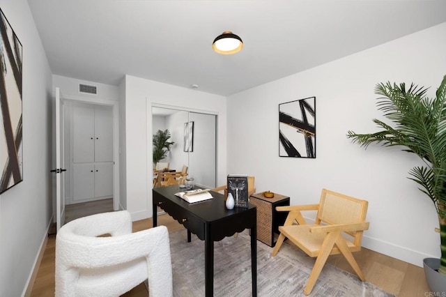 19222 S Grandee Ave, Carson, CA 90746 - home office with light wood-style floors and baseboards