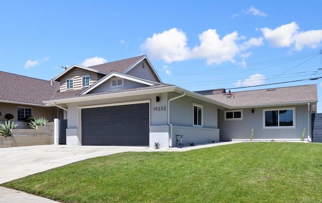 19222 S Grandee Ave, Carson, CA 90746 - view of front facade featuring an attached garage, driveway, a front lawn, and a shingled roof