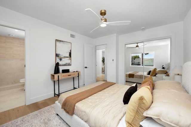 19222 S Grandee Ave, Carson, CA 90746 - bedroom featuring wood finished floors, a closet, ensuite bathroom, and ceiling fan
