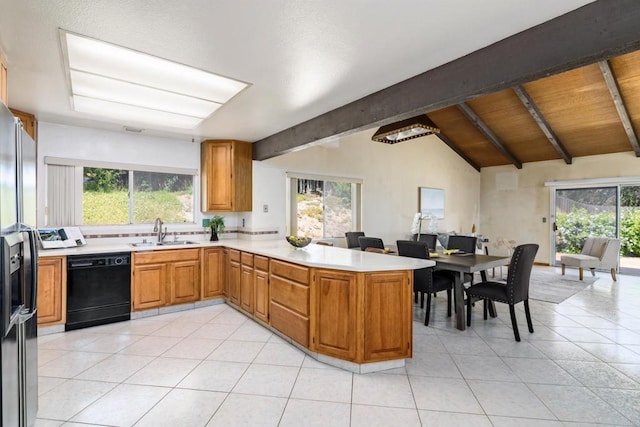 10665 Loire Ave, San Diego, CA 92131 - kitchen with black dishwasher, light countertops, and plenty of natural light