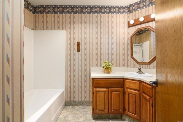 10665 Loire Ave, San Diego, CA 92131 - bathroom featuring wallpapered walls and vanity