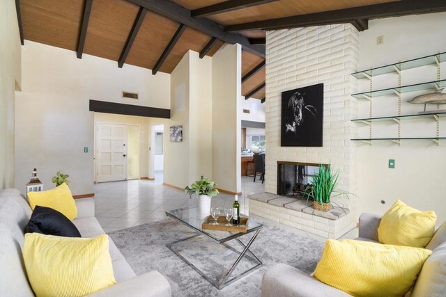 10665 Loire Ave, San Diego, CA 92131 - tiled living room with a fireplace, high vaulted ceiling, and a wood ceiling with exposed beams
