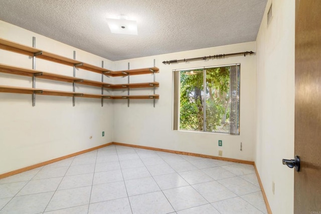 10665 Loire Ave, San Diego, CA 92131 - unfurnished room featuring a textured ceiling