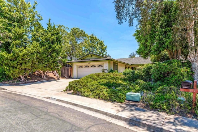 10665 Loire Ave, San Diego, CA 92131 - view of front of house with an attached garage, driveway, and stucco siding