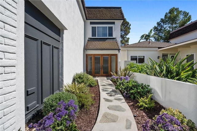 20 Mayapple Way, Irvine, CA 92612 - view of exterior entry with french doors and stucco siding