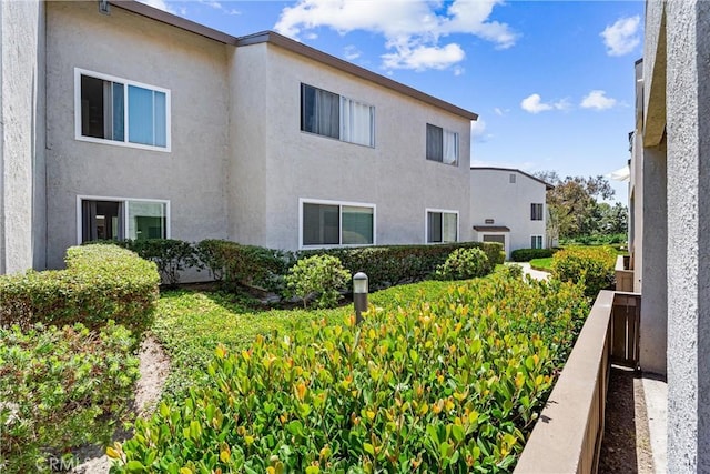21951 Rimhurst Dr Unit F201, Lake Forest, CA 92630 - view of property exterior with stucco siding