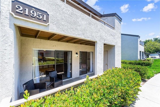 21951 Rimhurst Dr Unit F201, Lake Forest, CA 92630 - entrance to property featuring stucco siding