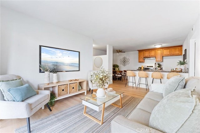21951 Rimhurst Dr Unit F201, Lake Forest, CA 92630 - living room featuring light wood-style flooring