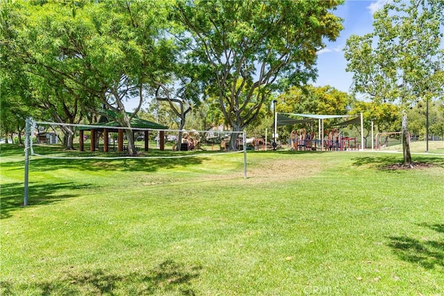21951 Rimhurst Dr Unit F201, Lake Forest, CA 92630 - surrounding community featuring a yard, volleyball court, and a gazebo