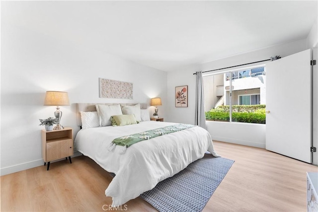 21951 Rimhurst Dr Unit F201, Lake Forest, CA 92630 - bedroom featuring light wood finished floors