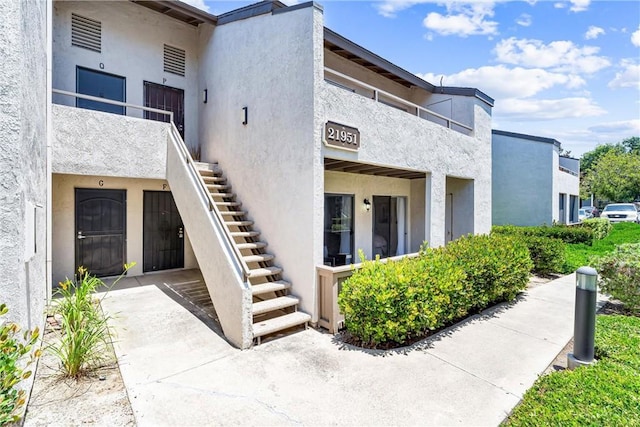 21951 Rimhurst Dr Unit F201, Lake Forest, CA 92630 - view of building exterior featuring stairs