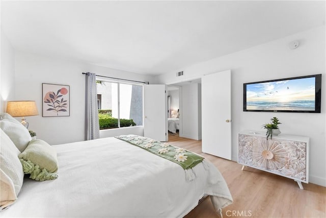 21951 Rimhurst Dr Unit F201, Lake Forest, CA 92630 - bedroom featuring wood finished floors