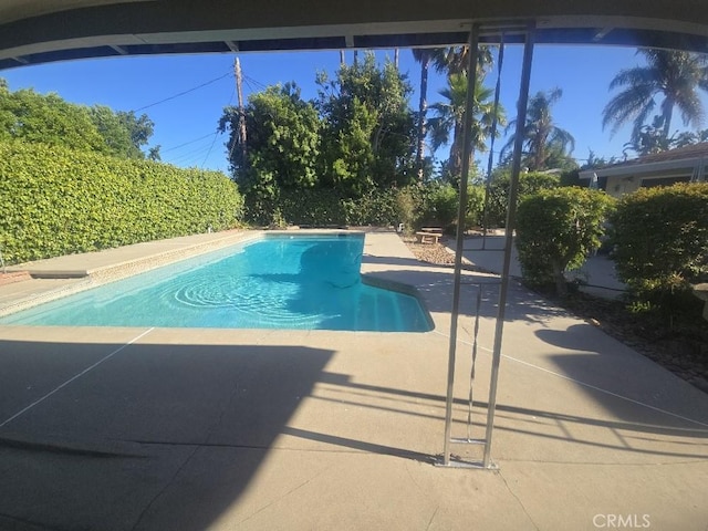 8450 Limerick Ave, Winnetka, CA 91306 - view of swimming pool featuring a patio