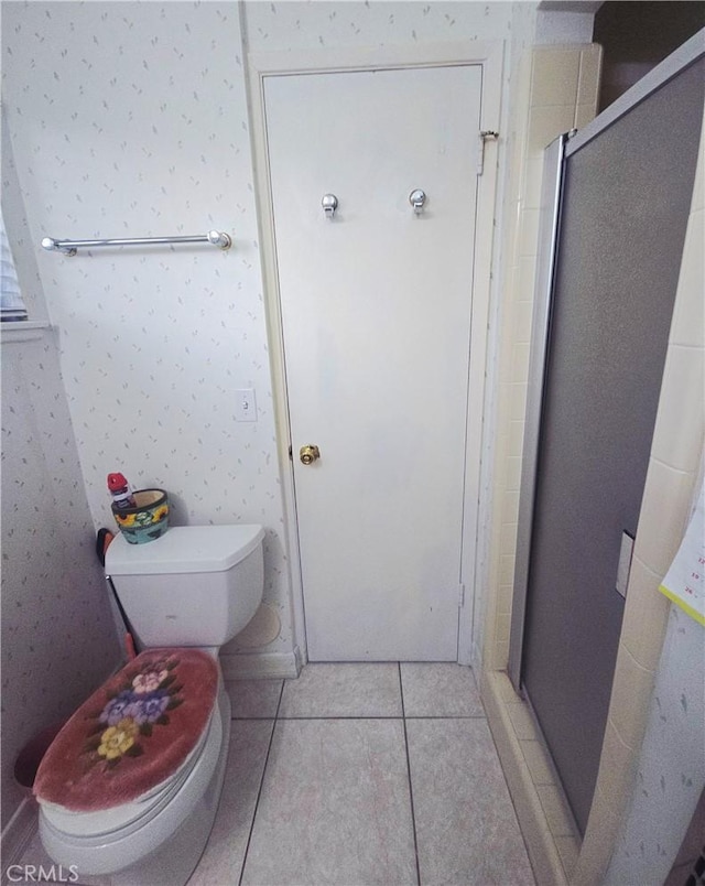 8450 Limerick Ave, Winnetka, CA 91306 - full bath featuring a shower stall, tile patterned floors, and wallpapered walls