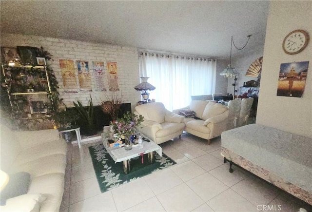 8450 Limerick Ave, Winnetka, CA 91306 - tiled living area featuring brick wall and a textured ceiling