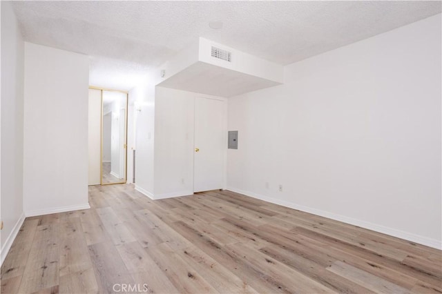 7205 Summertime Ln, Culver City, CA 90230 - spare room with light wood-style floors and a textured ceiling